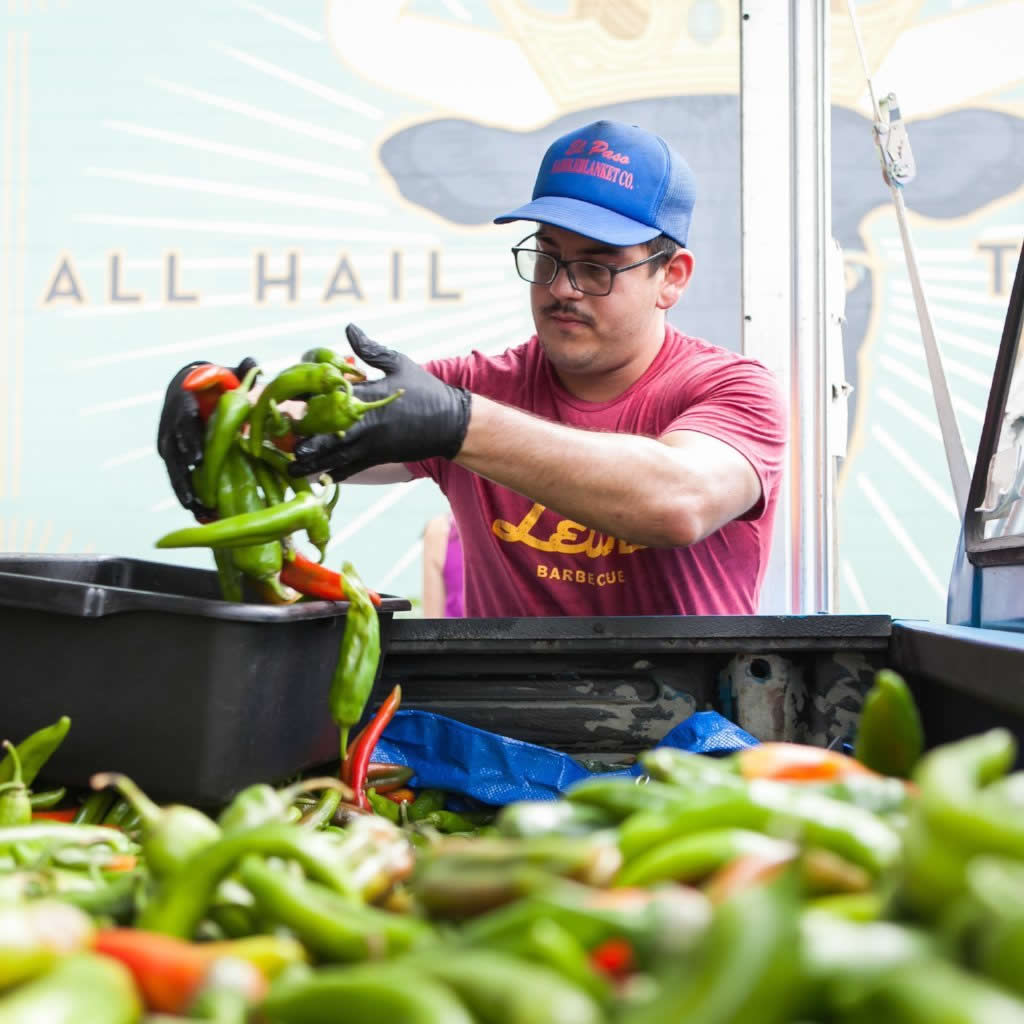 hatch green chile peppers preparing to be roasted for bbq sauce